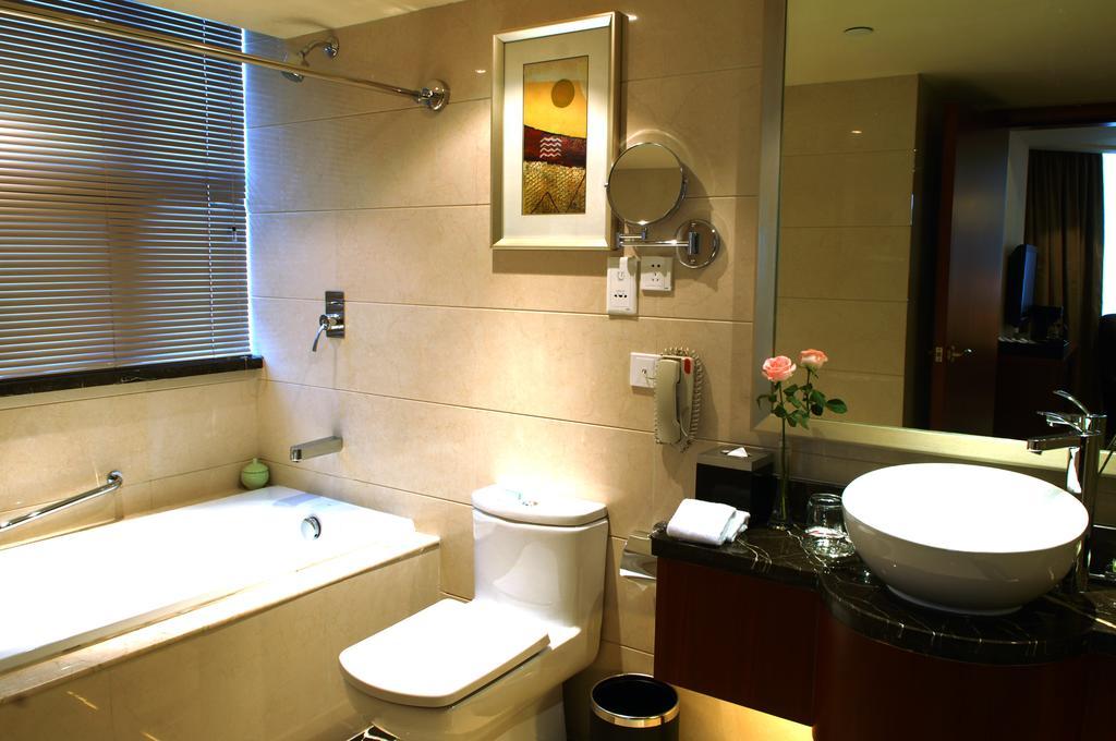 Merryland Traders Hotel Changshu Phòng bức ảnh